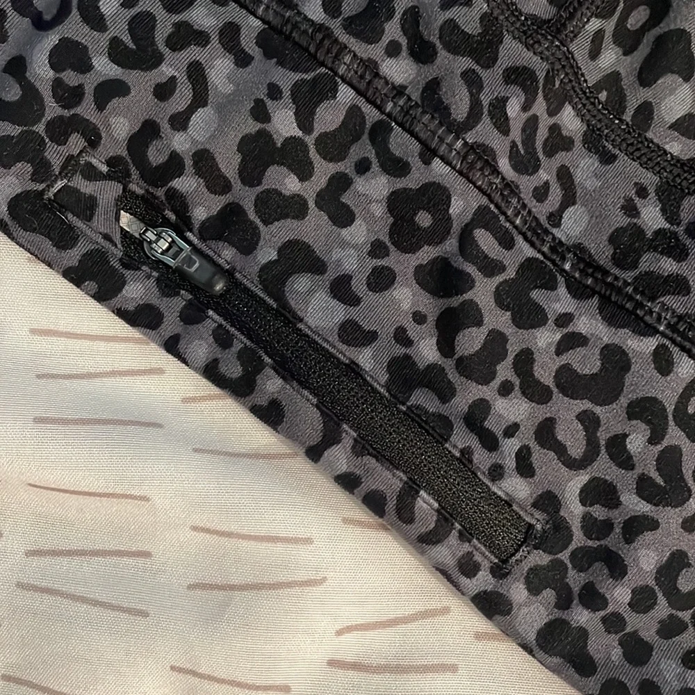 Nike dri fit gray and black leopard print capri leggings with back pocket